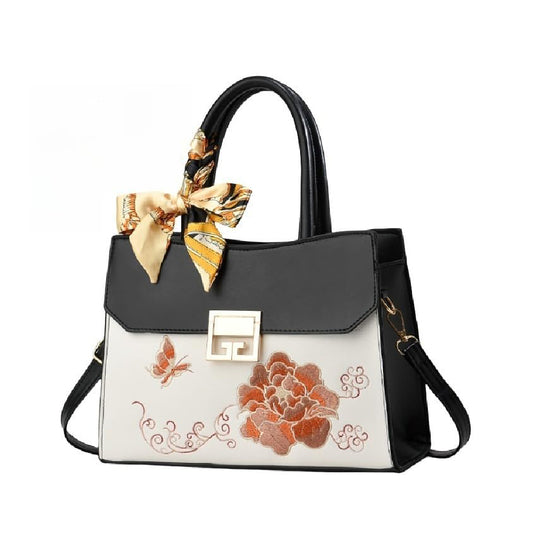 Dollcini Hímzett Női Kézitáska – Elegáns Alkalmi Táska