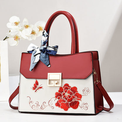 Dollcini Hímzett Női Kézitáska – Elegáns Alkalmi Táska