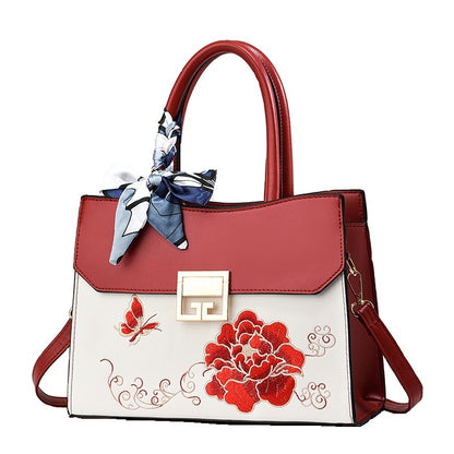 Dollcini Hímzett Női Kézitáska – Elegáns Alkalmi Táska