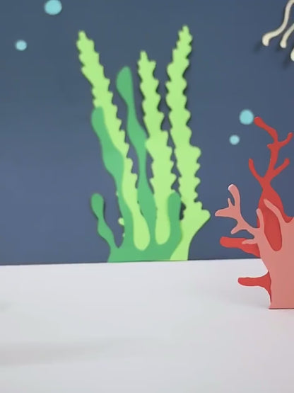 Dollcini Zenélő Mászó Polip Játék – LED Fényekkel, USB-s