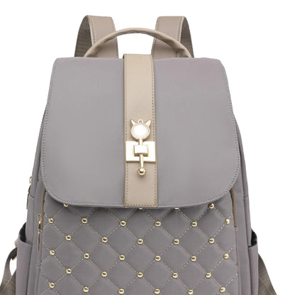 Dollcini Lopásgátló Nylon Hátizsák – Nagy Kapacitású Campus Hátizsák, Arany díszítéssel