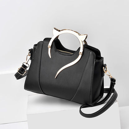 Dollcini Outlet Női Kézitáska – Elegáns, Cicás Fogantyúval, Szépséghibás termék